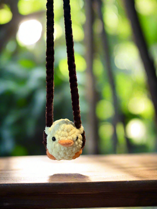 Baby Yellow Duck on Swing